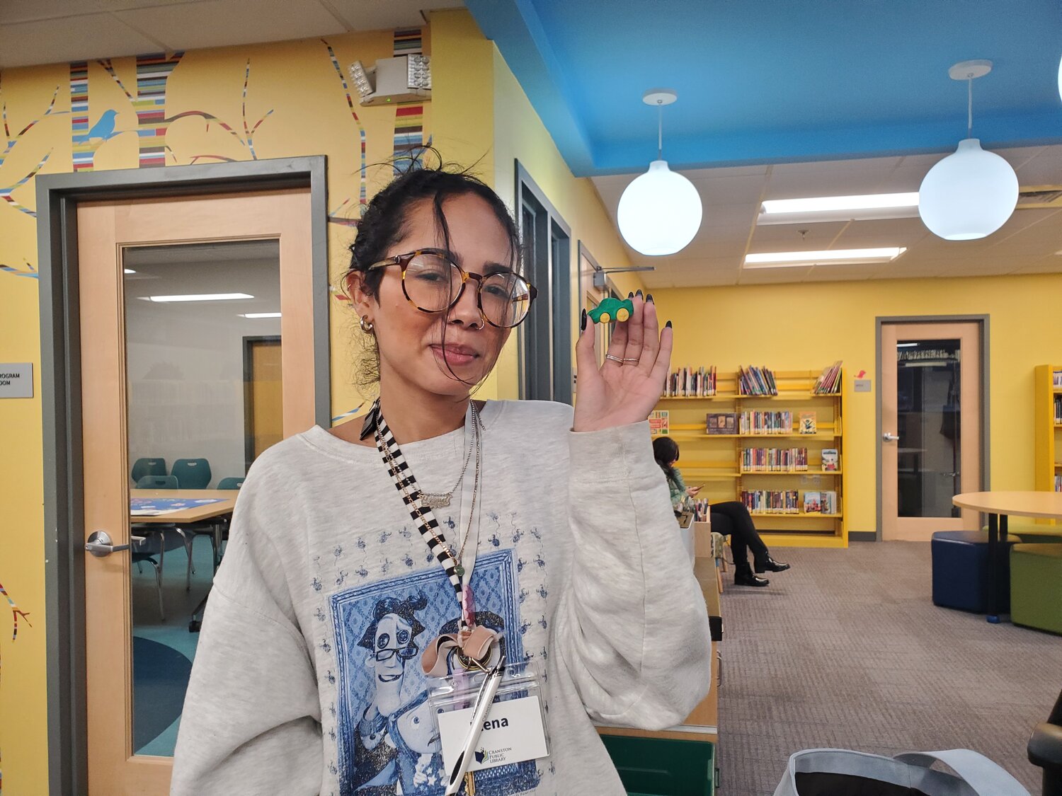LITTLE GREEN ERASER: Elena Rios holds the eraser that has inspired her throughout her career, and during her Community Builders grant.